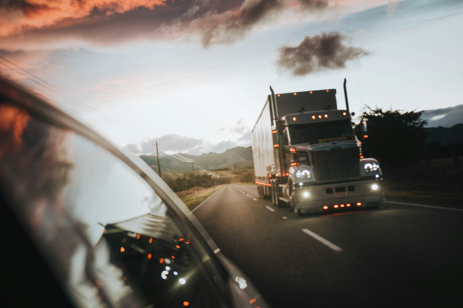 Freight truck on the road at dusk