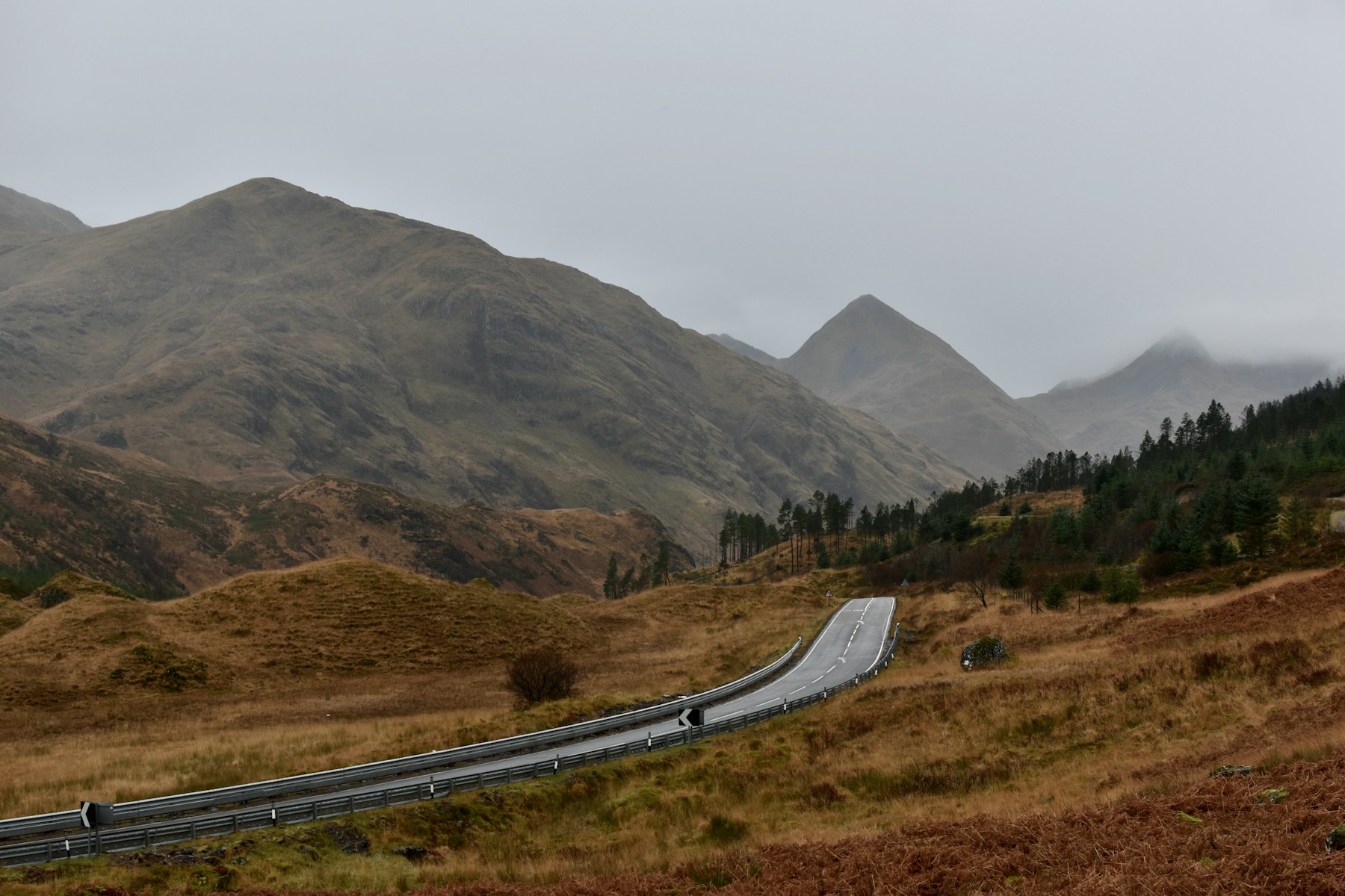 A winding road through the Scottish Highlands
